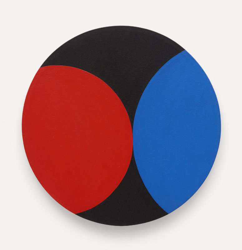 circular tondo painting, primary red and blue circles, of different sizes coming together in the center of the canvas to barely touch, they are set on a black background and cropped tightly so about half of the shapes can't be seen.