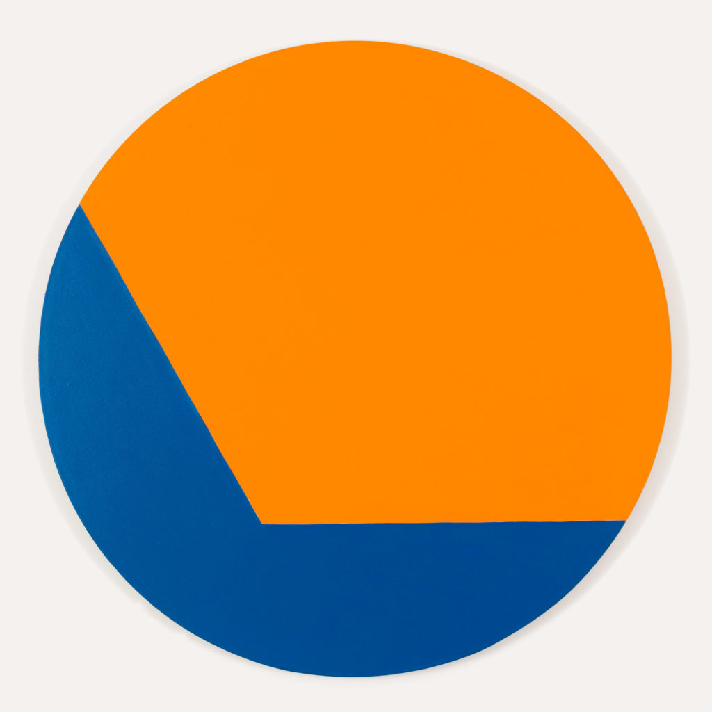 Circular 'tondo' canvas can be seen as a cobalt blue can vas with a large orange angular shape coming in from the top right to overtake most of the canvas, or you could look at it as an orange canvas with the blue shape cradeling the orange from the bottom left.