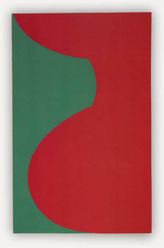 tall rectangular canvas with two shapes cutting into each other. From the left a green shape cuts into red, it is slightly anchored on the bottom but mainly protrudes into the top, making it look like it's using a lot of energy to stay perched up there.