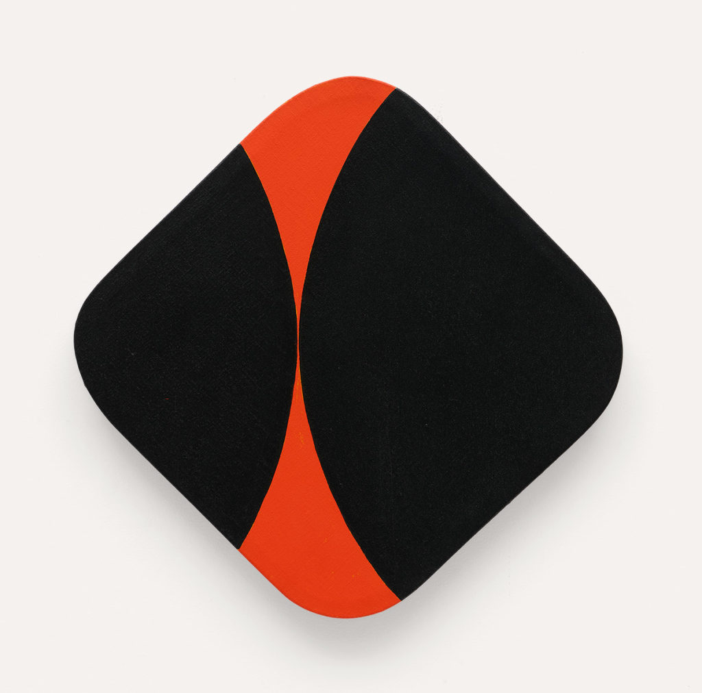 rounded square canvas, hung rotated like the shape of a diamond. Can be seen as a bright red canvas with very large black circles coming in from the sides to meet in the middle. Also look slike bright red sharp shapes coming from the top and bottom to touch.