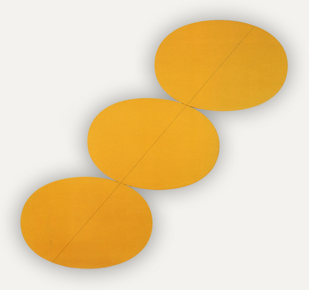 Three oval canvases painted mustard yellow, arranged in a stairstep pattern going upwards to the right. There is a black hairline intersecting them all perfectly in half also traveling from bottom left to top right.